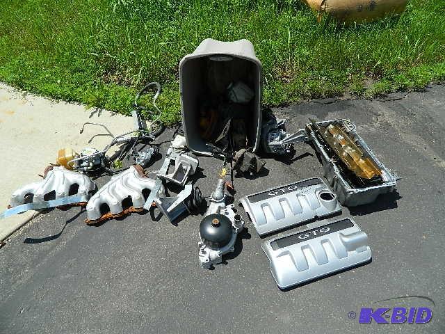 lot 86 image: 2006 GTO LS2 parts to include oil pan, water...