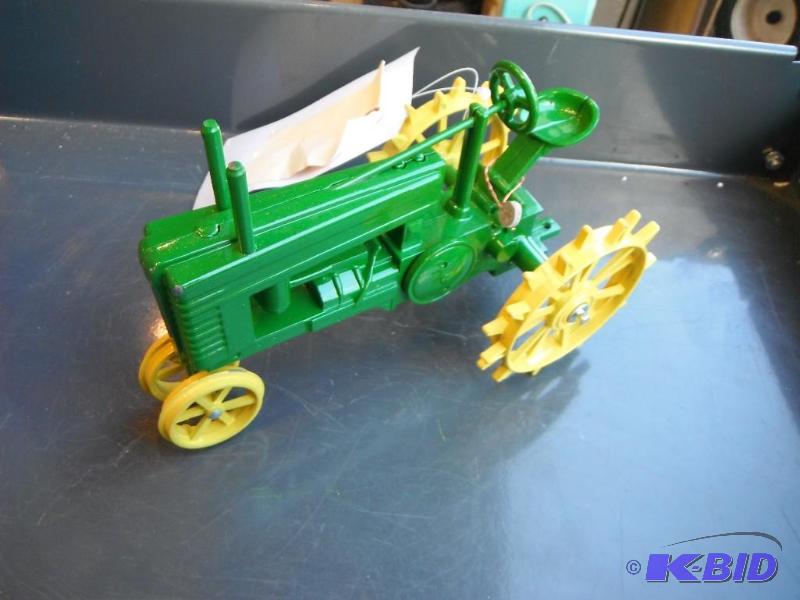 lot 23 image: Vintage Green and Yellow Toy Tractor...
