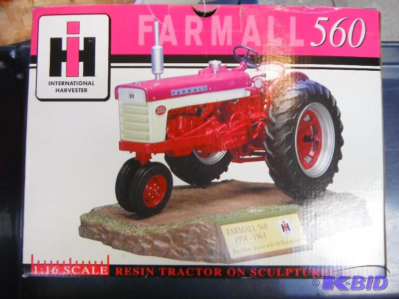 lot 31 image: Farmall 560 Tractor on Sculptured Base...