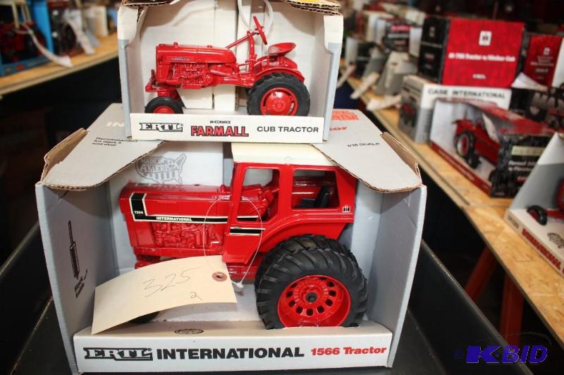 lot 325 image: Farmall Cub Tractor and International 1566 Tr...