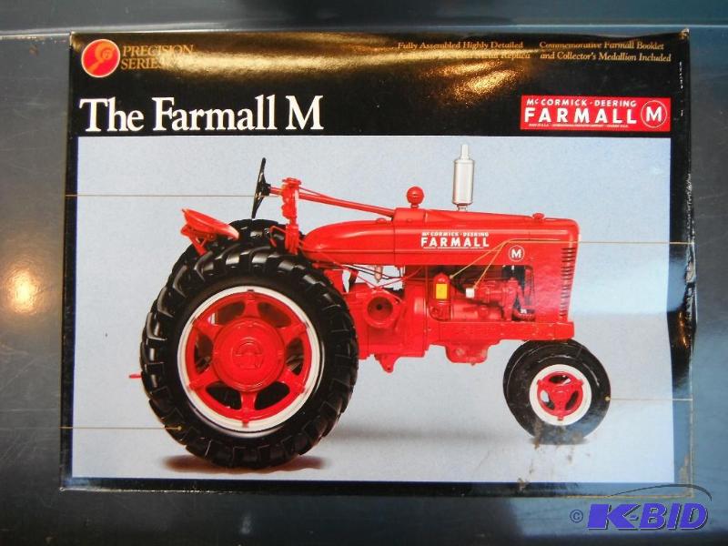 lot 34 image: McCormick Deering Farmall M Tractor Precision...
