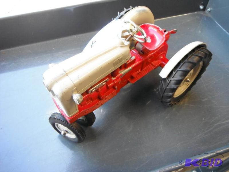 lot 4 image: Vintage Grey and Red Toy Tractor...