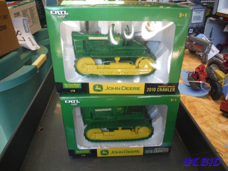 lot 461 image: Two John Deere 2010 Crawler Tractors...