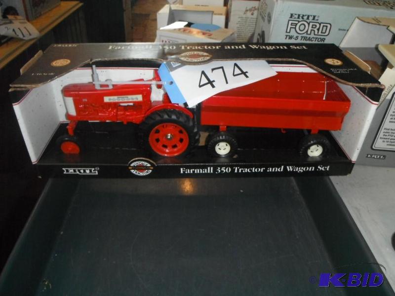 lot 474 image: Farmall 350 Tractor and Wagon Set...