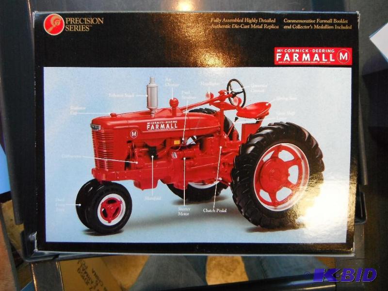 lot 54 image: McCormick Deering Farmall M Tractor Precision...