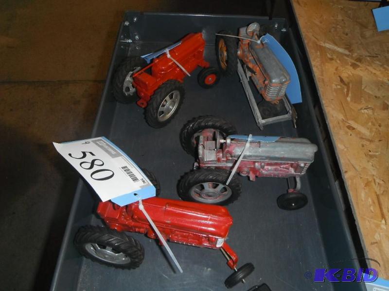 lot 580 image: A Collection of Four Hubley Tractors...