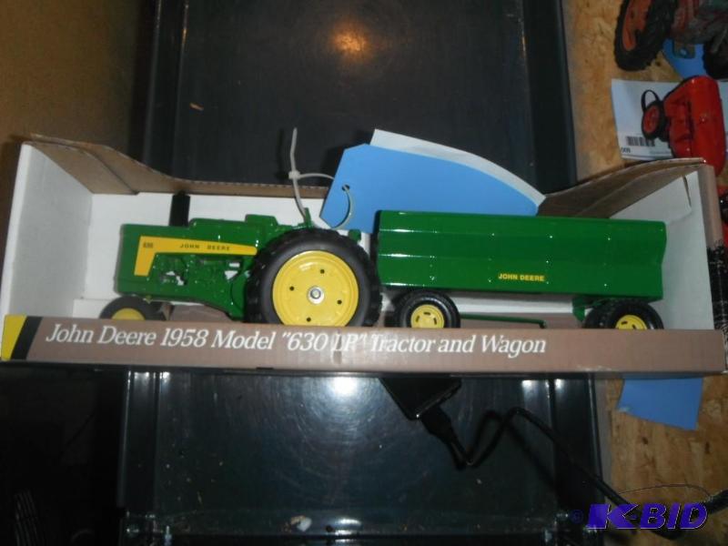 lot 610 image: John Deere 1958 Model 630 LP Tractor and Wago...