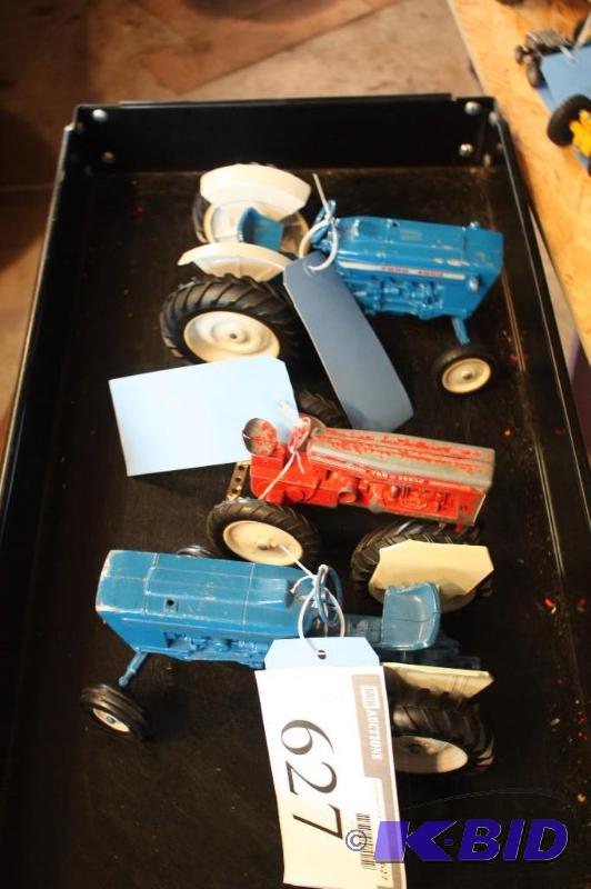 lot 627 image: A Collection of Tractors Including a Ford 460...