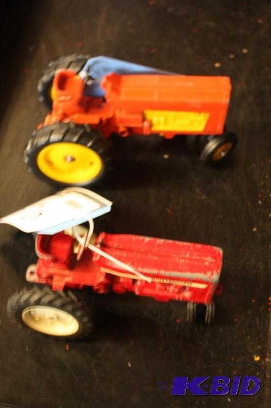 lot 676 image: A Hubley Tractor and International Tractor...
