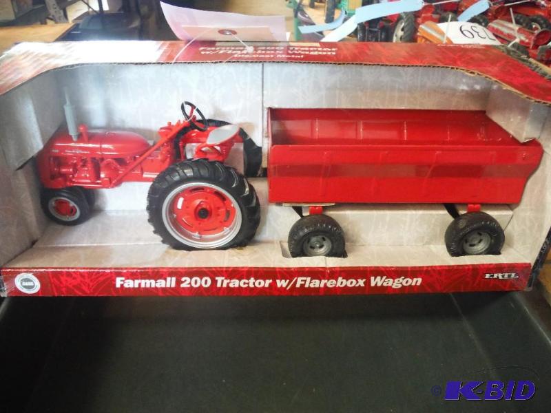 lot 730 image: Farmall 200 Tractor with Flarebox Wagon...
