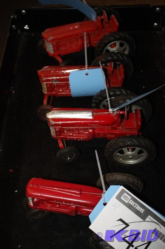 lot 744 image: A Collection of Four Hubley Tractors...