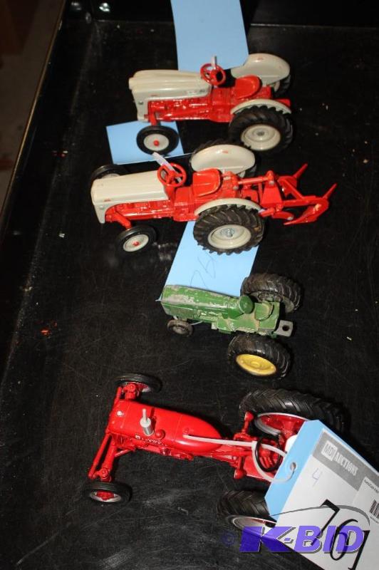 lot 761 image: A Collection of Tractors Including a Ford Tra...