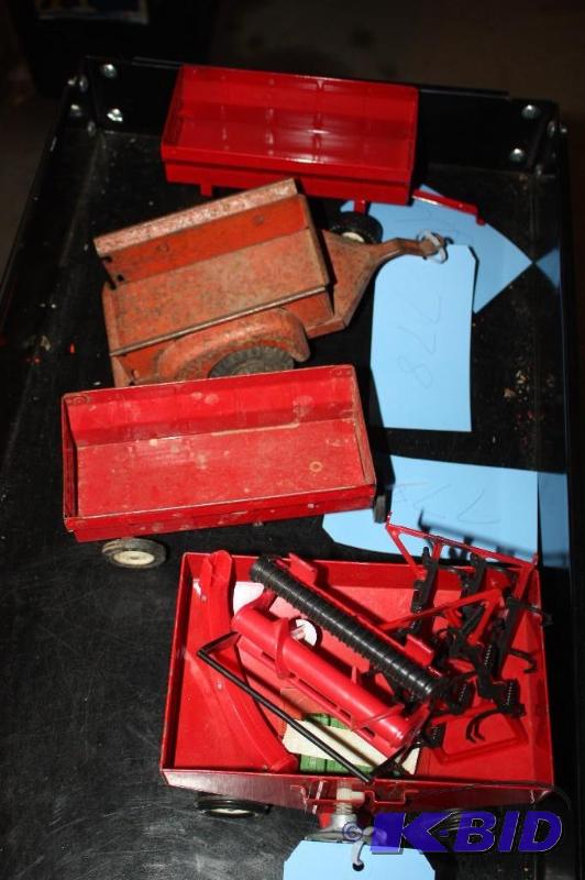 lot 778 image: Lot of (4) Red Toy Tractor Trailers...
