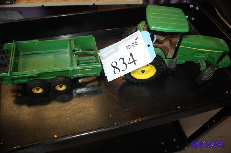 lot 834 image: John Deere 8200 Tractor with a John Deere Wag...