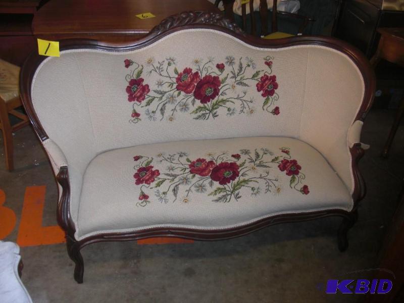 Victorian style Love Seat.. Looks like Walnut...