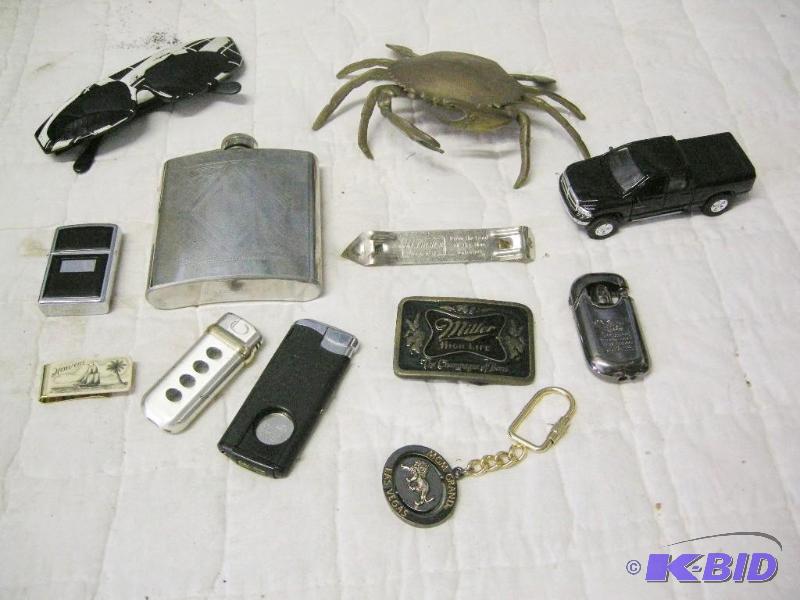 lot 63 image: Hamms Opener, Zippo & other lighters, more