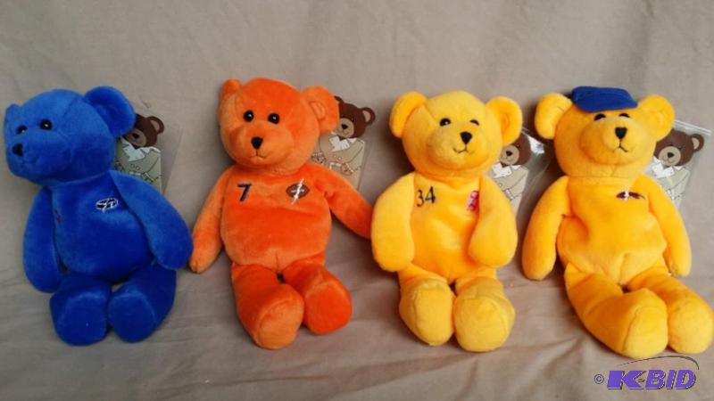 4 Collectible bears all new with tags includi...