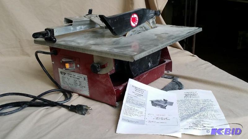 lot 23 image: 7" &nbspBench top wet tile saw. 35 HP ...