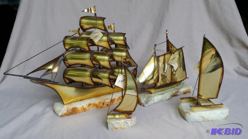 lot 42 image: Set of 4 DeMott brass sail boats mounted on i...