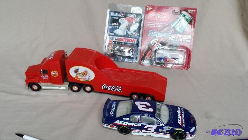 lot 53 image: Lot of 4 toy vehicles including a 124 scale ...