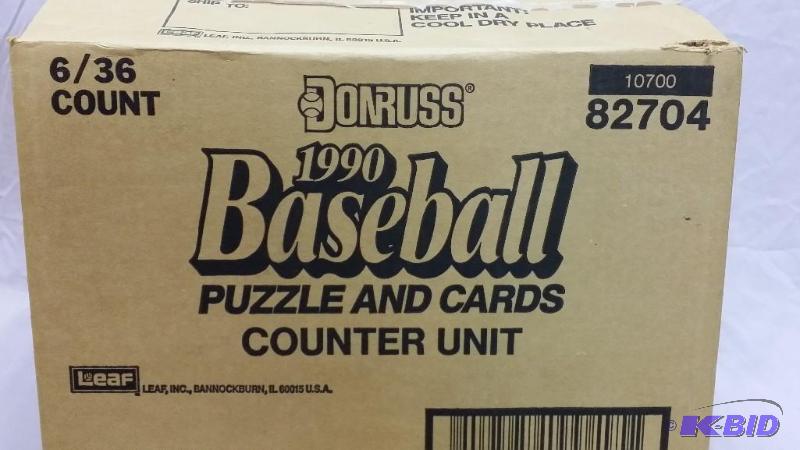 lot 61 image: 1990 Donruss Baseball cards in wax packs. The...
