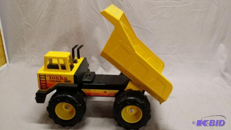 lot 68 image: Tonka Dump Truck measures 17" long and i...