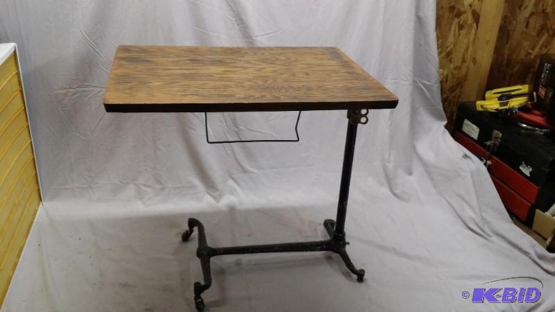lot 8 image: Tiger wood adjustable table with metal base....