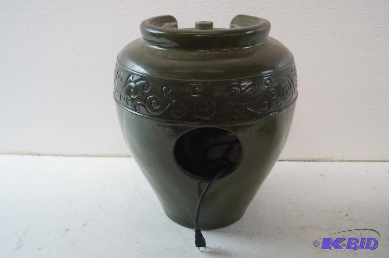 a green electric fountain
