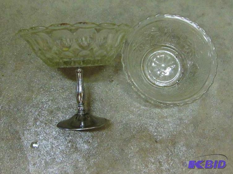 Antique glass bowl with antique bowl on silve...