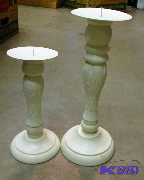 Pair of white candle holders...