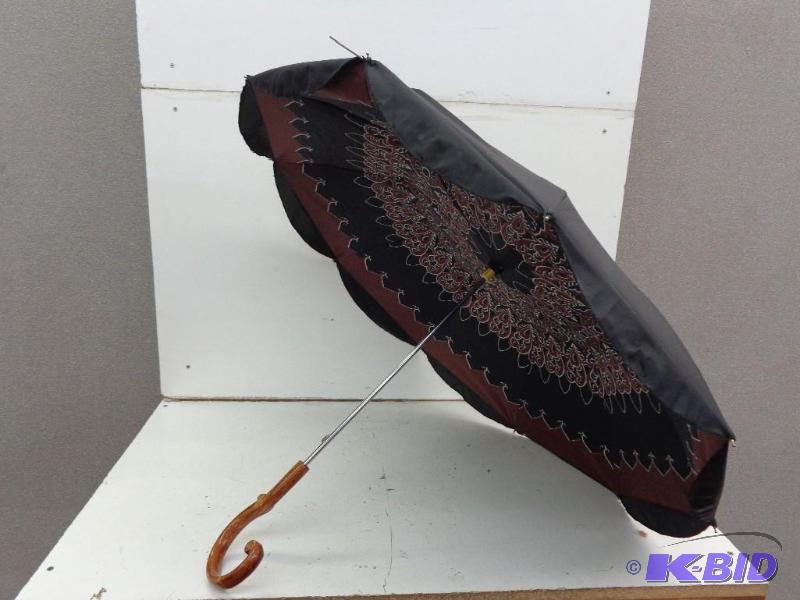 lot 112 image: Vintage Curved Handle Umbrella Handle is Made...