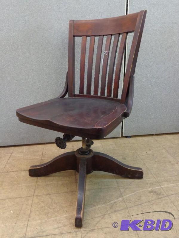 lot 14 image: Antique Wooden Swivel Chair Dark Solid Wood D...