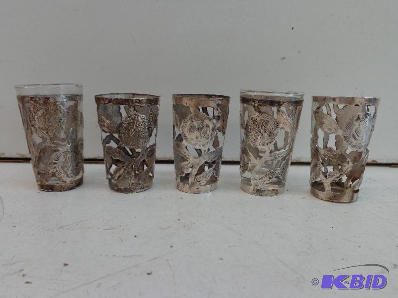 lot 41 image: 5 Shot Glass Sleeves Sleeves Look to be sterl...