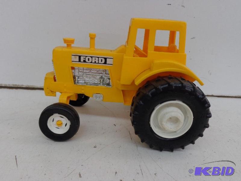 lot 93 image: Vintage Ford Toy Tractor Manufactured By Proc...