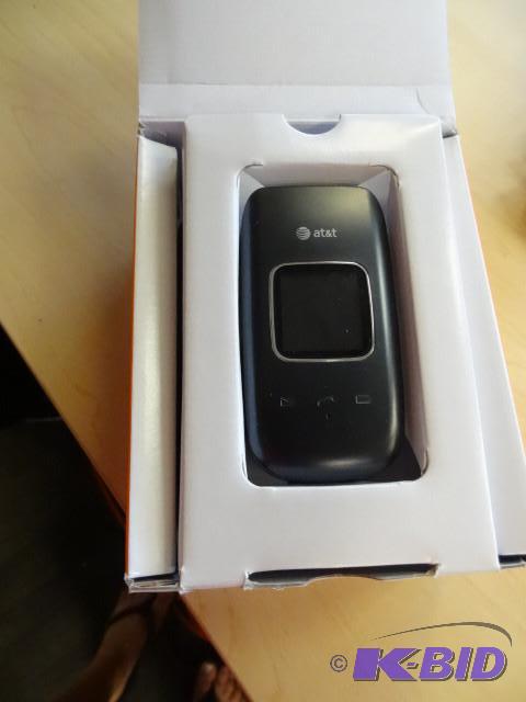 AT and T cellular flip phone. Includes charge...