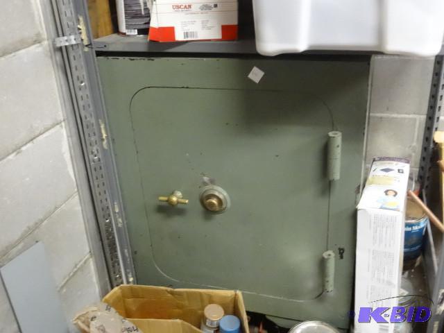 Vintage heavy duty safe. Has combo and it doe...