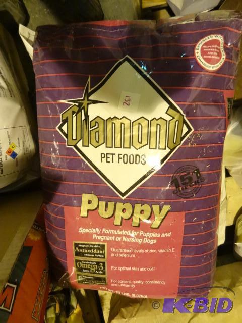 lot 132 image: Apporox 20 lbs Diamond Puppy Chow and 20 lbs ...