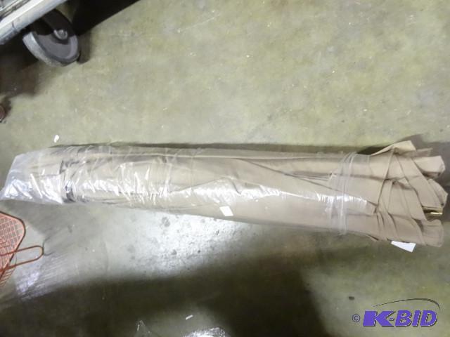 lot 217 image: New Beige Patio Umbrella includes second piec...