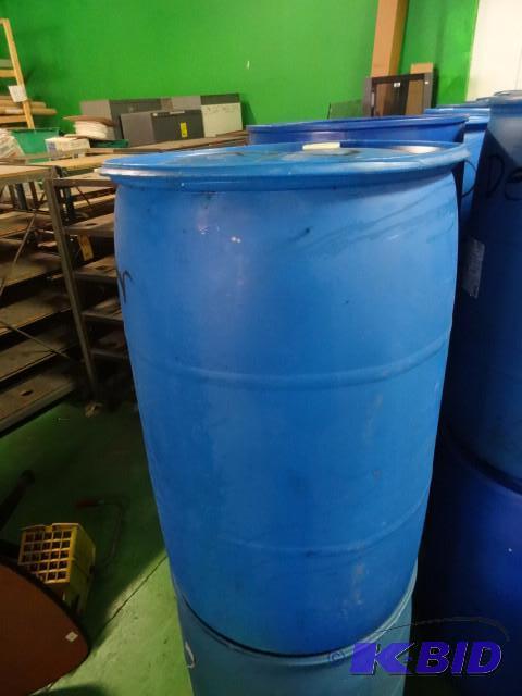 lot 281 image: Used 55 gal Blue Plastic Drum...