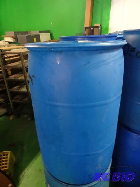 lot 283 image: Used 55 gal Blue Plastic Drum...