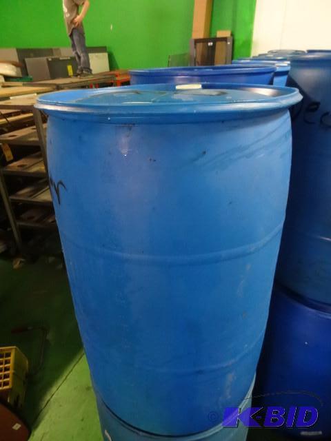 lot 284 image: Used 55 gal Blue Plastic Drum...