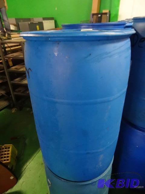 lot 285 image: Used 55 gal Blue Plastic Drum...