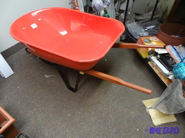 lot 57 image: New Plymouth Trading 6 cu ft steel wheel barr...