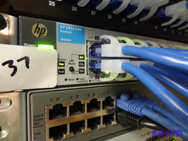 lot 12 image: HP 1810-48G switch...