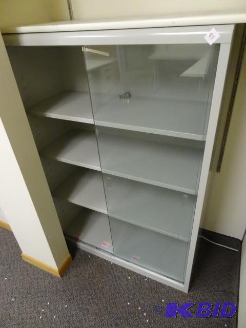 lot 87 image: Metal cabinet with 2 sliding glass doors. 36 ...