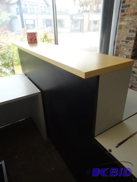 Check out counter with 3 drawer ped on wheels...