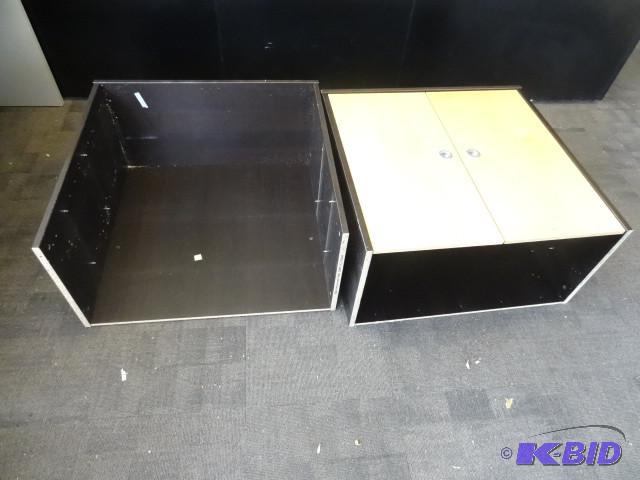 2 laminate cabinets without bottoms. Both hav...