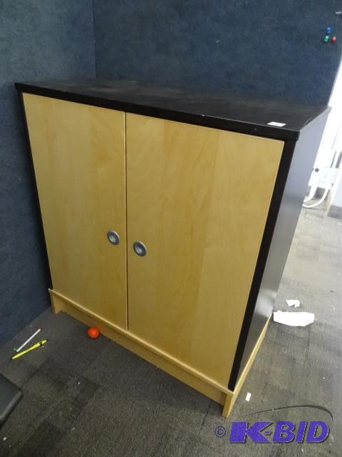 Laminate 2 door cabinet with 2 shelves 33x 17...