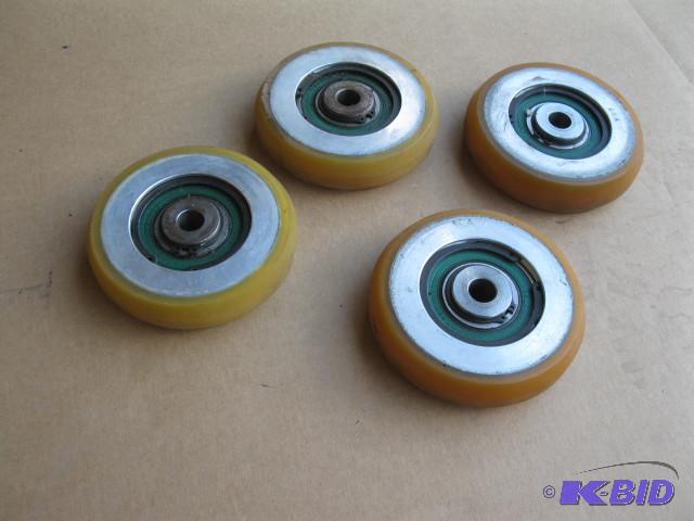 4 rubber wheels with bearings, 5 inches in di...