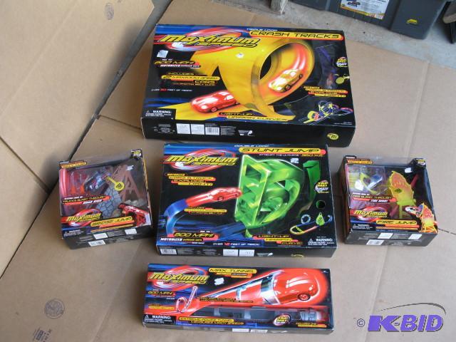 5 boxes of HotWheels type race cars and track...